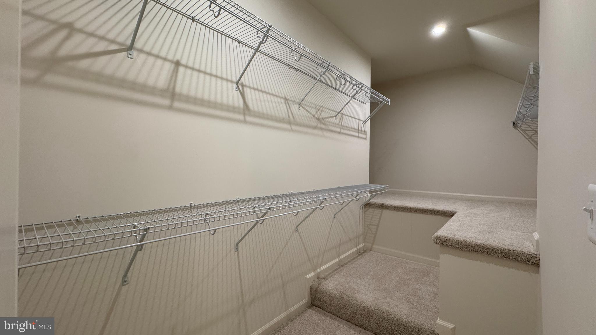 2613 River Birch Road Herndon, VA 20171 - Photo 10 of 14 a view of a room with racks on the wall