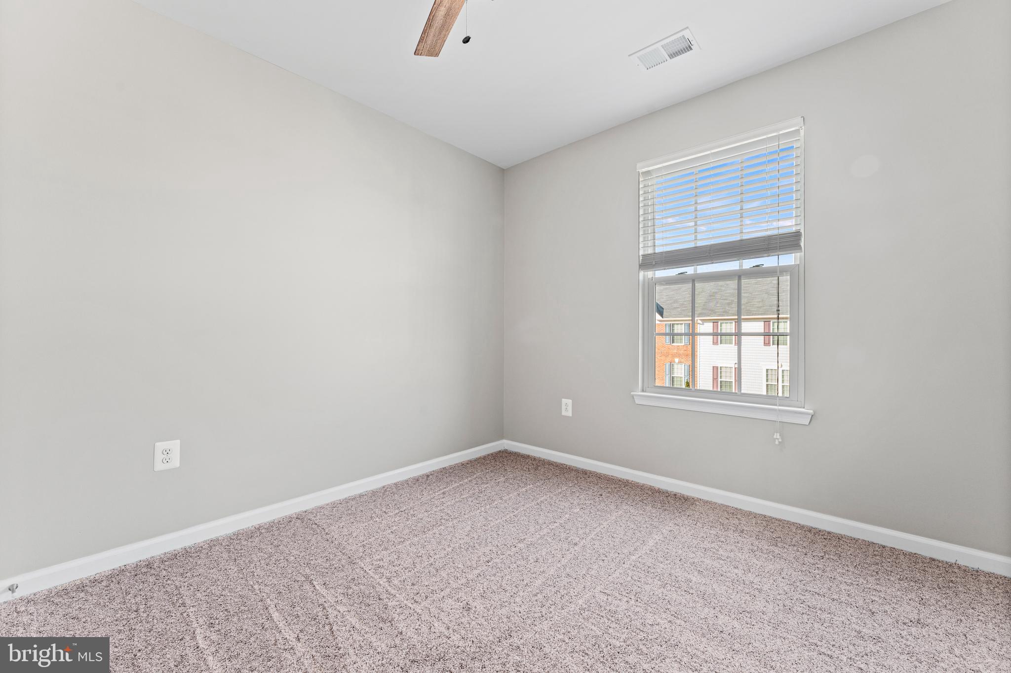 104 Spring Park Lane, Unit 43 Fredericksburg, VA 22405 - Photo 15 of 36 an empty room with windows