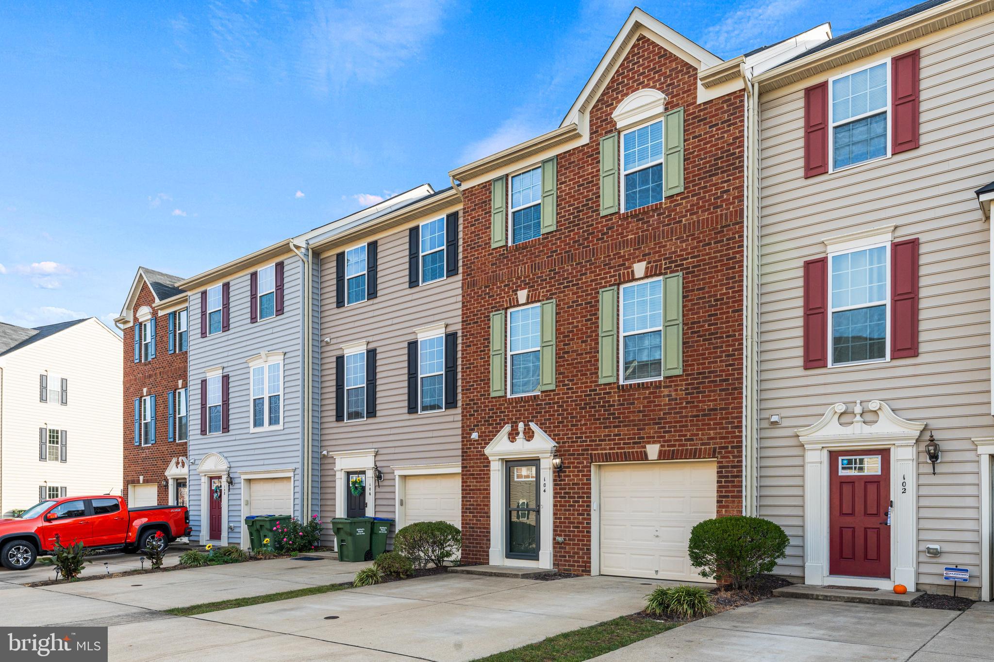 104 Spring Park Lane, Unit 43 Fredericksburg, VA 22405 - Photo 2 of 36 a front view of a building with street view