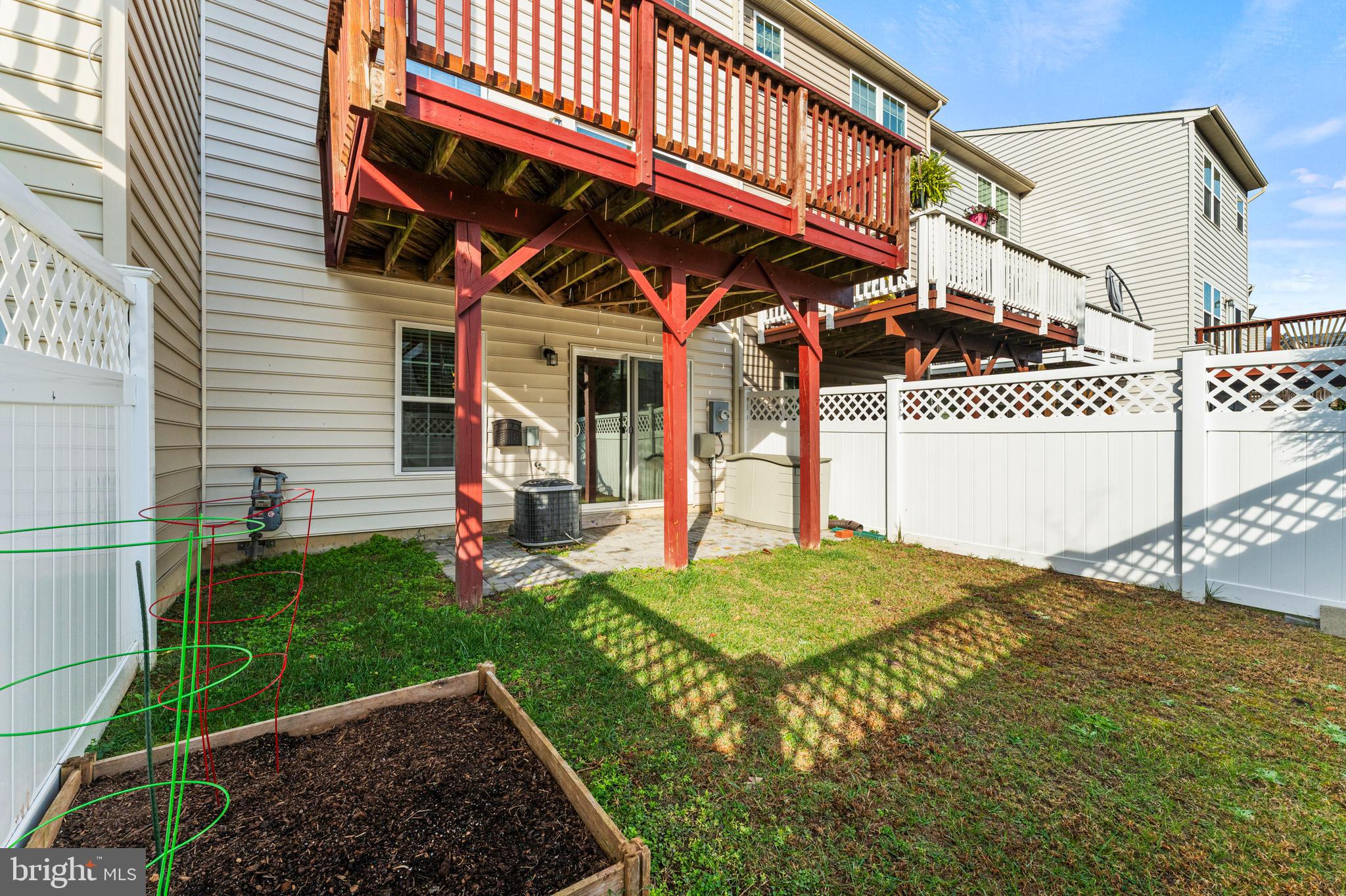 104 Spring Park Lane, Unit 43 Fredericksburg, VA 22405 - Photo 25 of 36 a view of a backyard