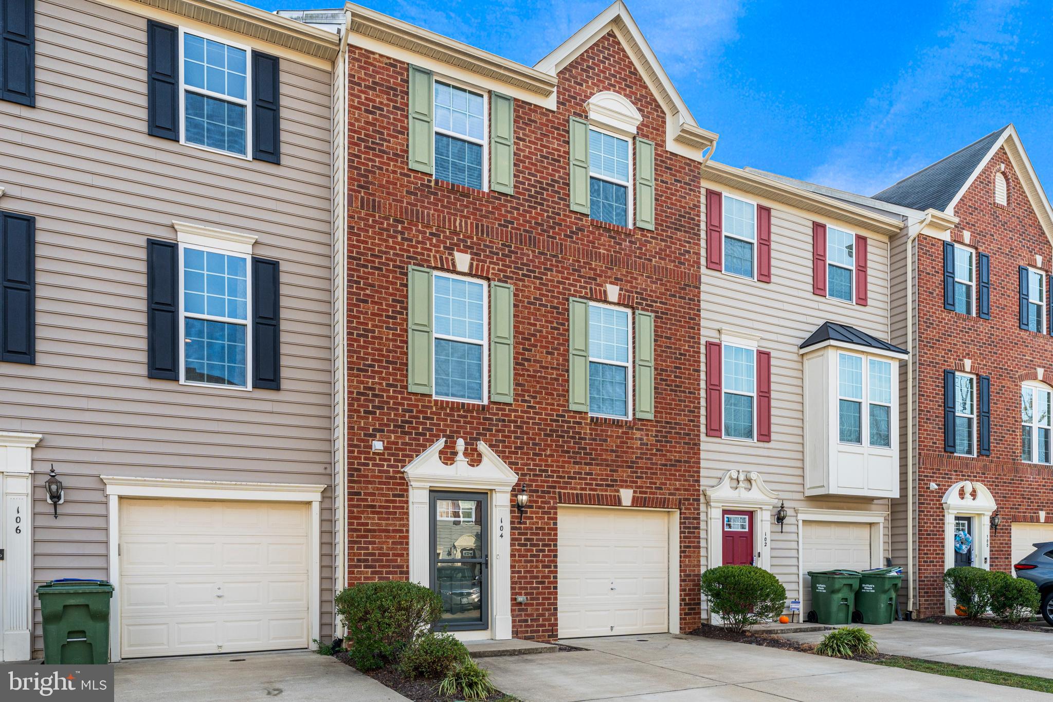 104 Spring Park Lane, Unit 43 Fredericksburg, VA 22405 - Photo 30 of 36 a front view of a house with a yard