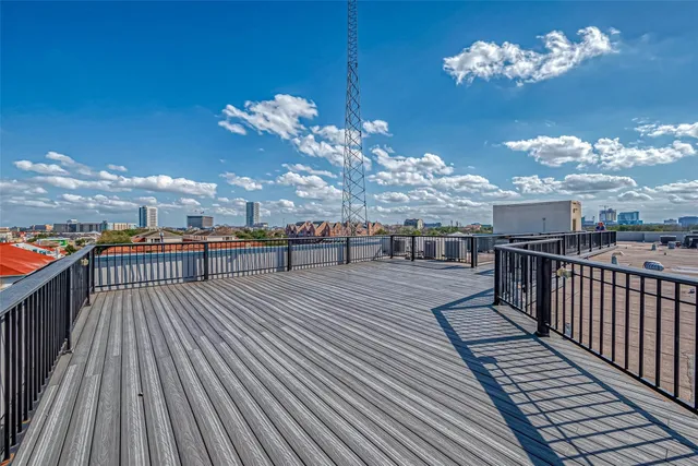 a view of a balcony with dining space
