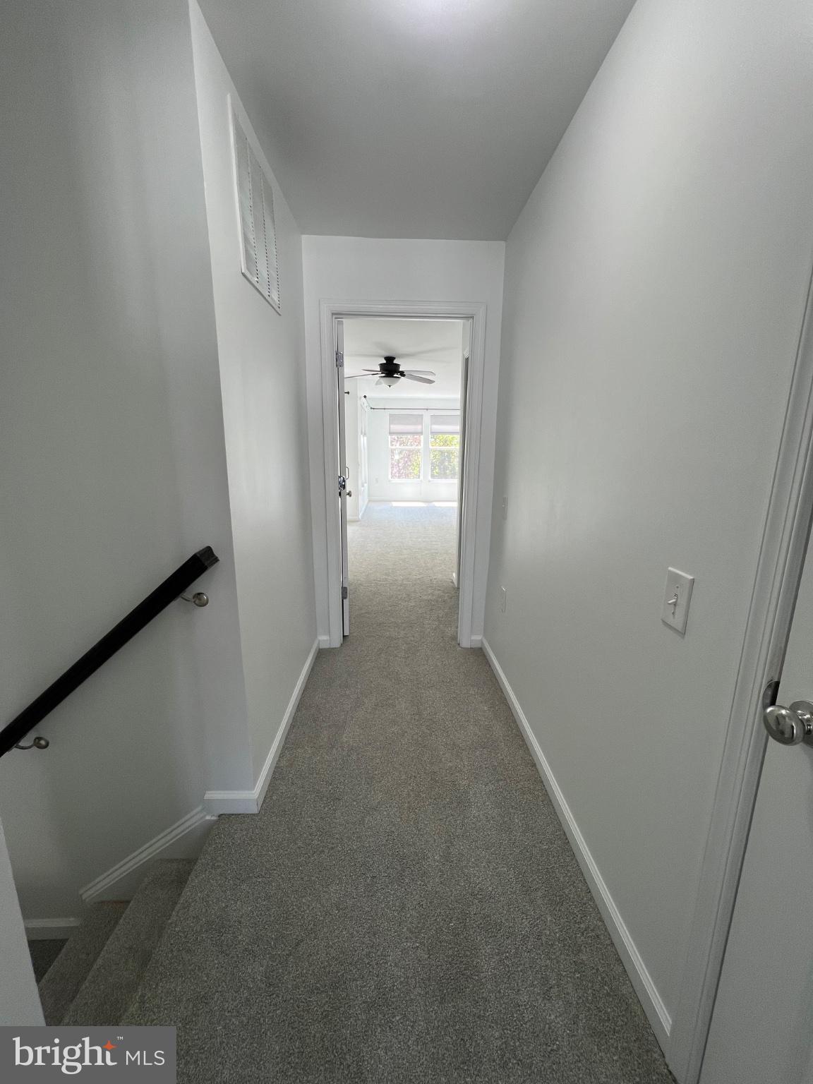 17087 Gibson Road Dumfries, VA 22026 - Photo 14 of 29 Hallway leading to primary bedroom