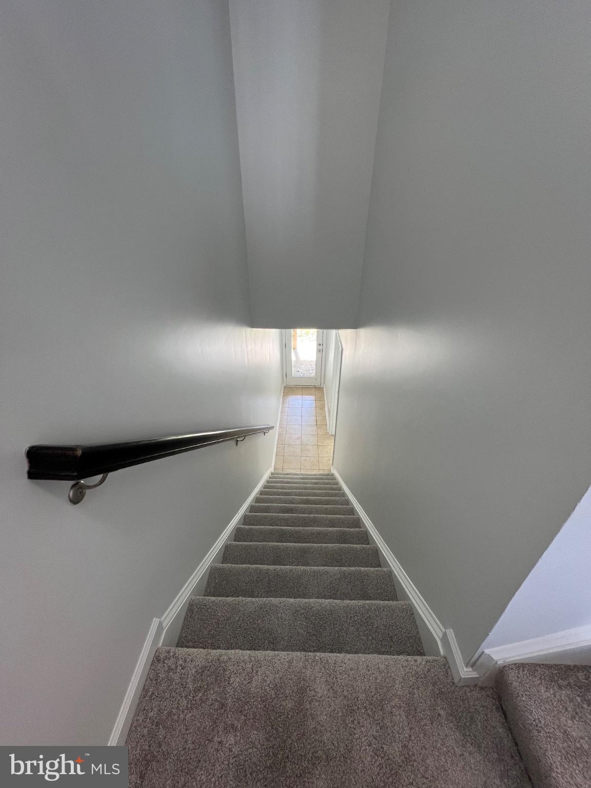17087 Gibson Road Dumfries, VA 22026 - Photo 25 of 29 Stairwell to lower level bedroom and walkout