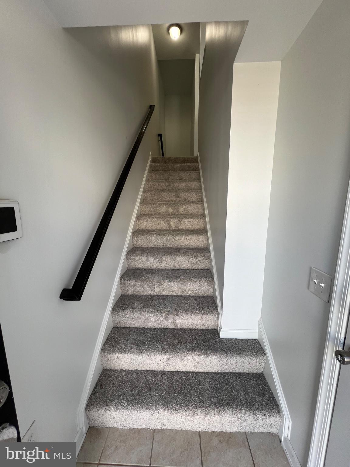 17087 Gibson Road Dumfries, VA 22026 - Photo 3 of 29 Inviting staircase to upper living space.