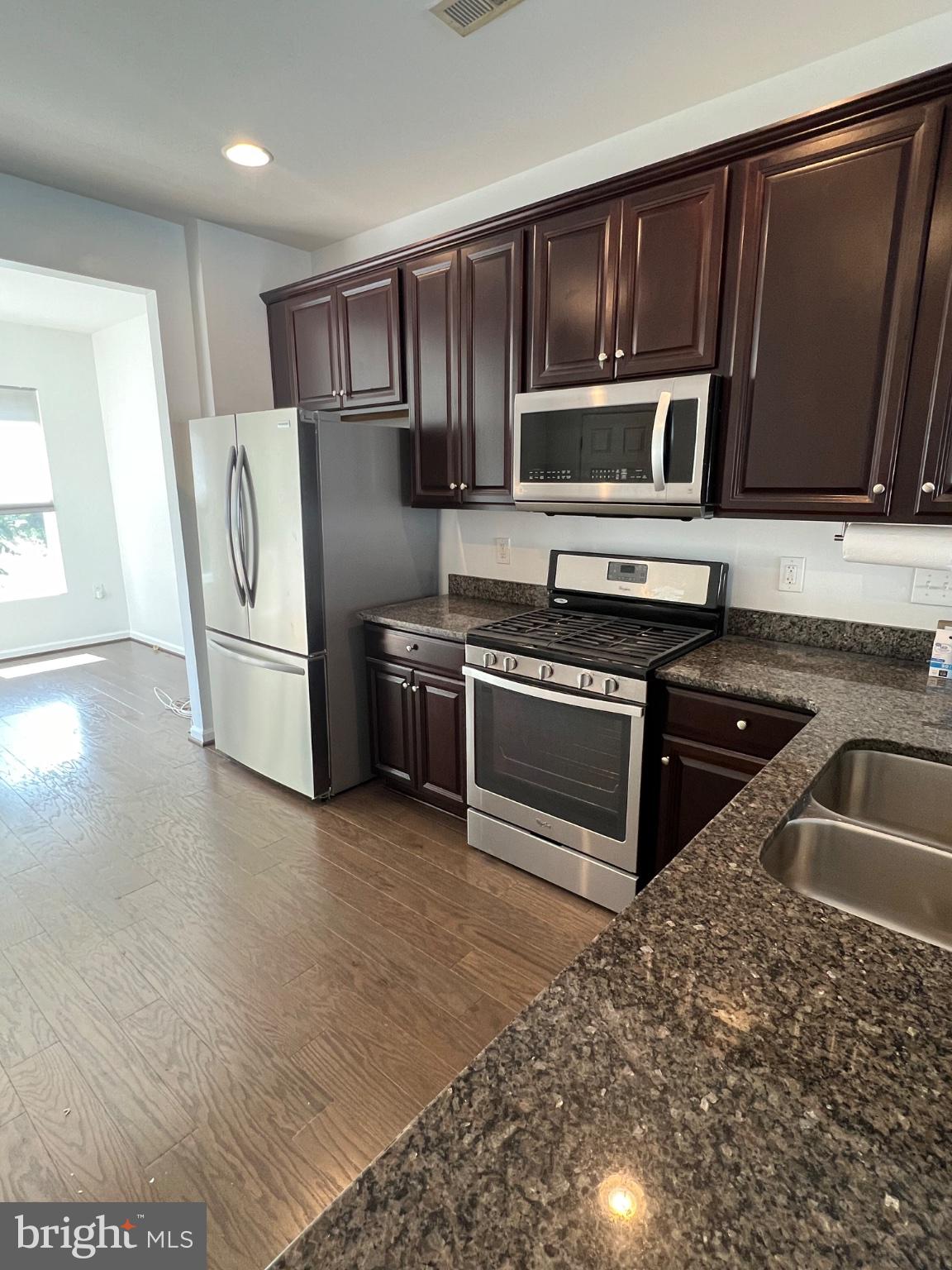 17087 Gibson Road Dumfries, VA 22026 - Photo 7 of 29 Modern kitchen with sleek finishes.