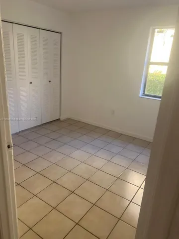 a view of a room and window