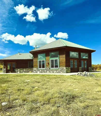 a house view with a swimming pool