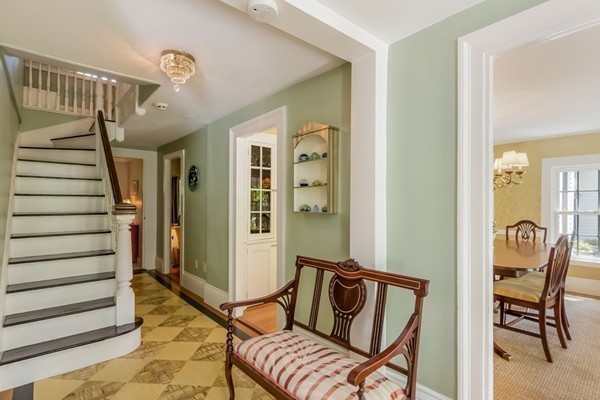 595 Bay Road Hamilton, MA 01982 - Photo 16 of 30 a living room with furniture and a chair