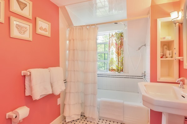 595 Bay Road Hamilton, MA 01982 - Photo 22 of 30 a bathroom with a sink and a bathtub