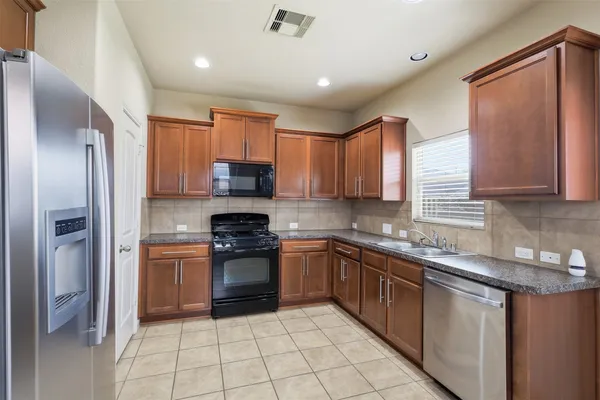 $2,200 | 8911 Headstall Drive, Tomball, TX 77375