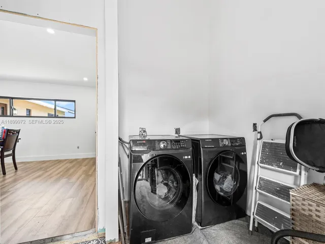 a view of living room washer and dryer