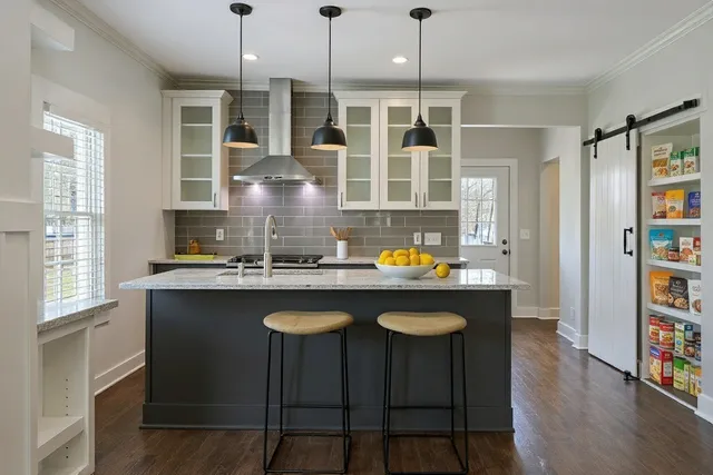 a bathroom with a sink and mirror