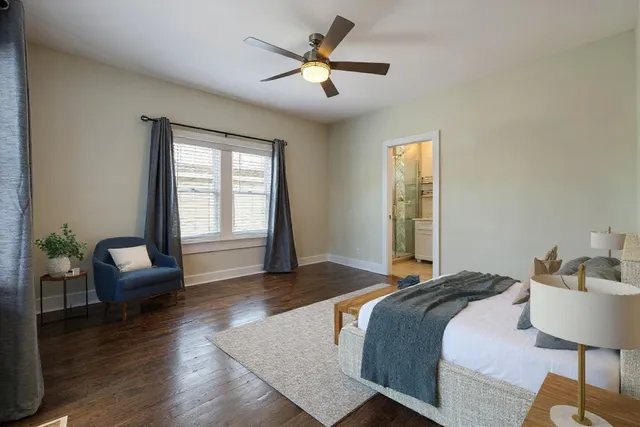 a view of entryway with stairs and wooden floor