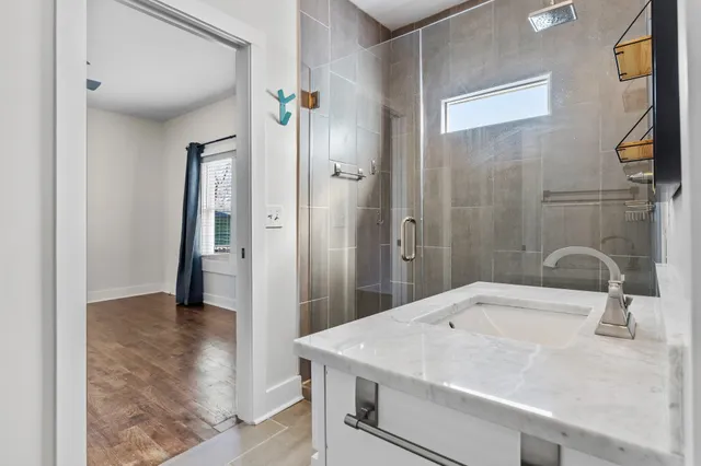 a view of a room with shelf on the wall