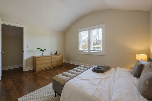 a view of a house with backyard porch and sitting area