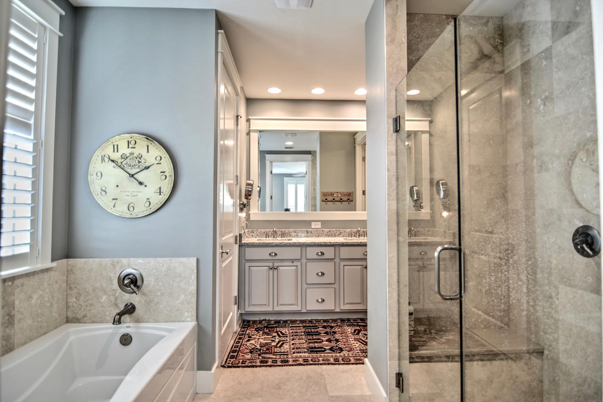 147 Jack Knife Drive Watersound, FL 32461 - Photo 12 of 42 a bathroom with a bathtub a mirror and a shower