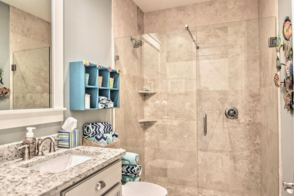 147 Jack Knife Drive Watersound, FL 32461 - Photo 17 of 42 a bathroom with a granite countertop sink toilet and shower