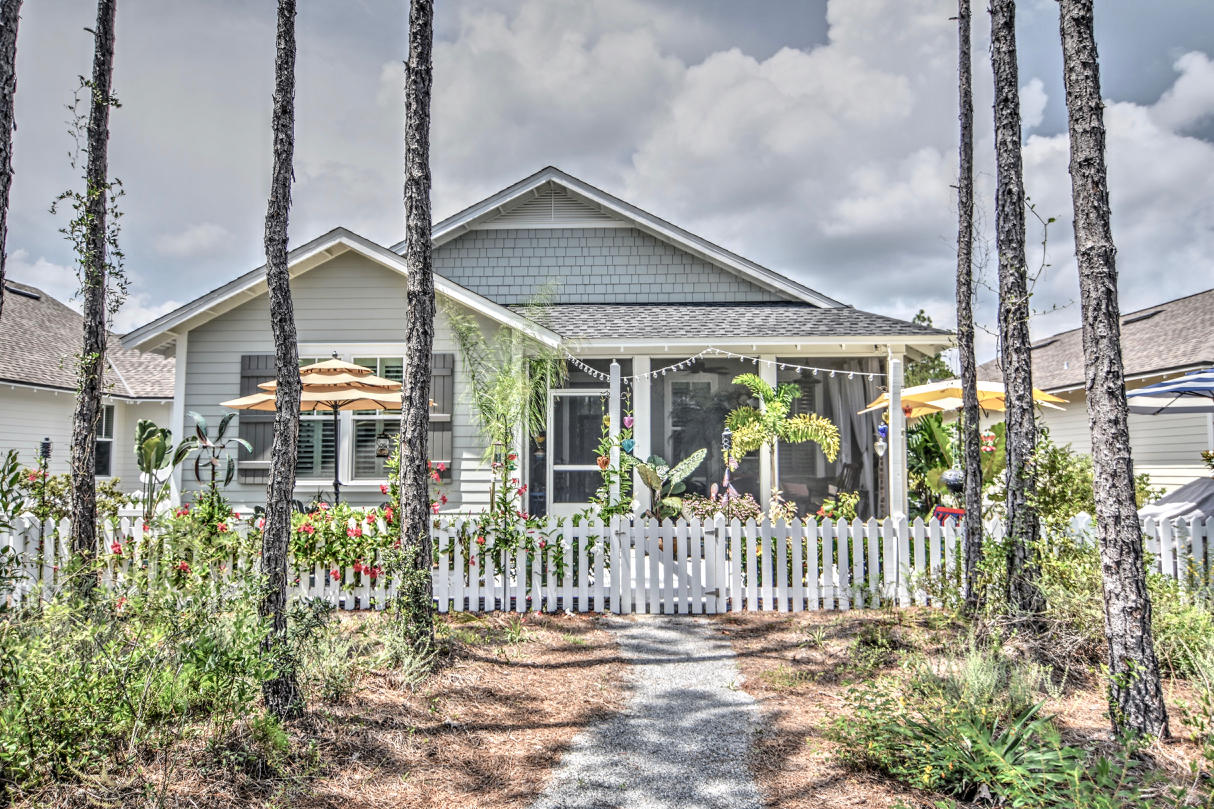 147 Jack Knife Drive Watersound, FL 32461 - Photo 22 of 42 a front view of a house with a porch