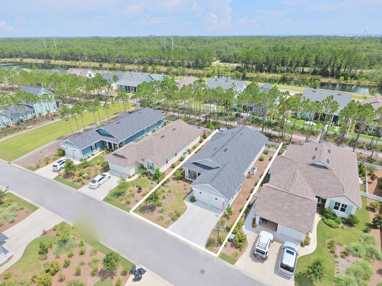 147 Jack Knife Drive Watersound, FL 32461 - Photo 24 of 42 an aerial view of residential houses with outdoor space and river