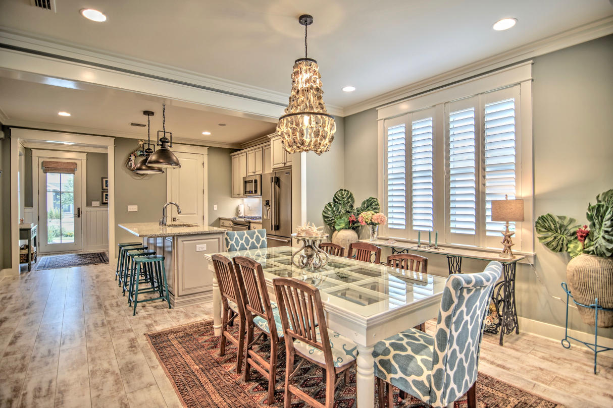 147 Jack Knife Drive Watersound, FL 32461 - Photo 7 of 42 a view of a a dining room with furniture window and wooden floor