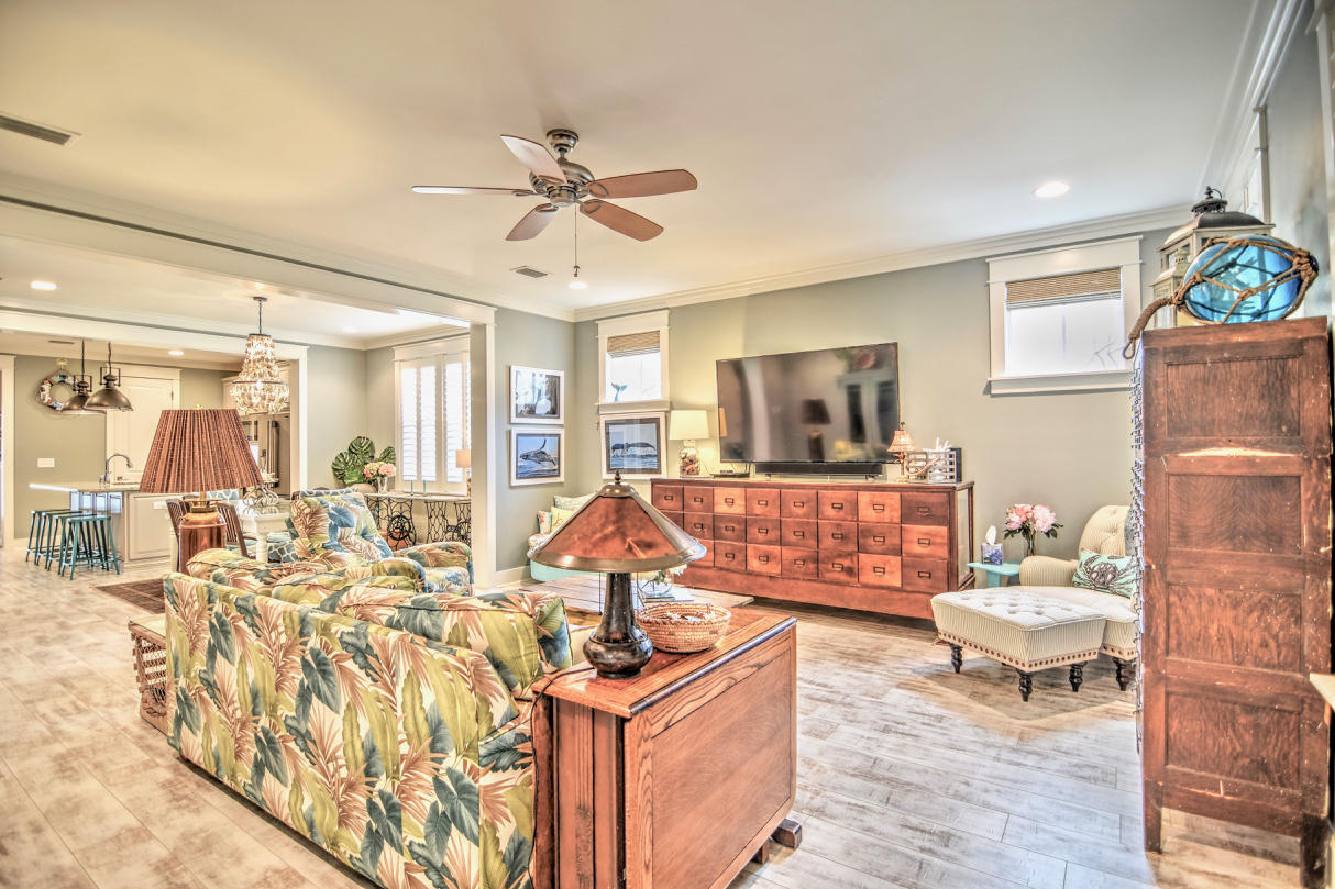 147 Jack Knife Drive Watersound, FL 32461 - Photo 9 of 42 a living room with furniture and a flat screen tv