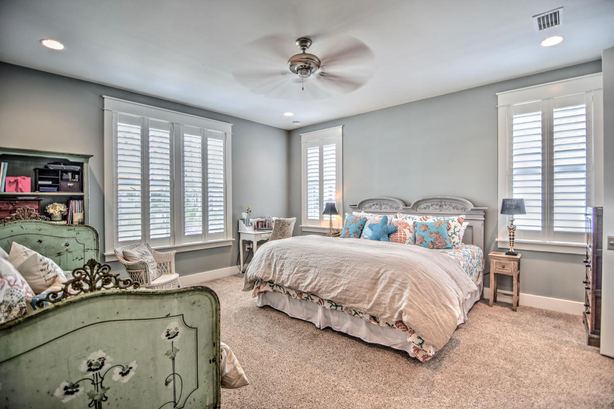 147 Jack Knife Drive Watersound, FL 32461 - Photo 10 of 42 a bedroom with a bed and window