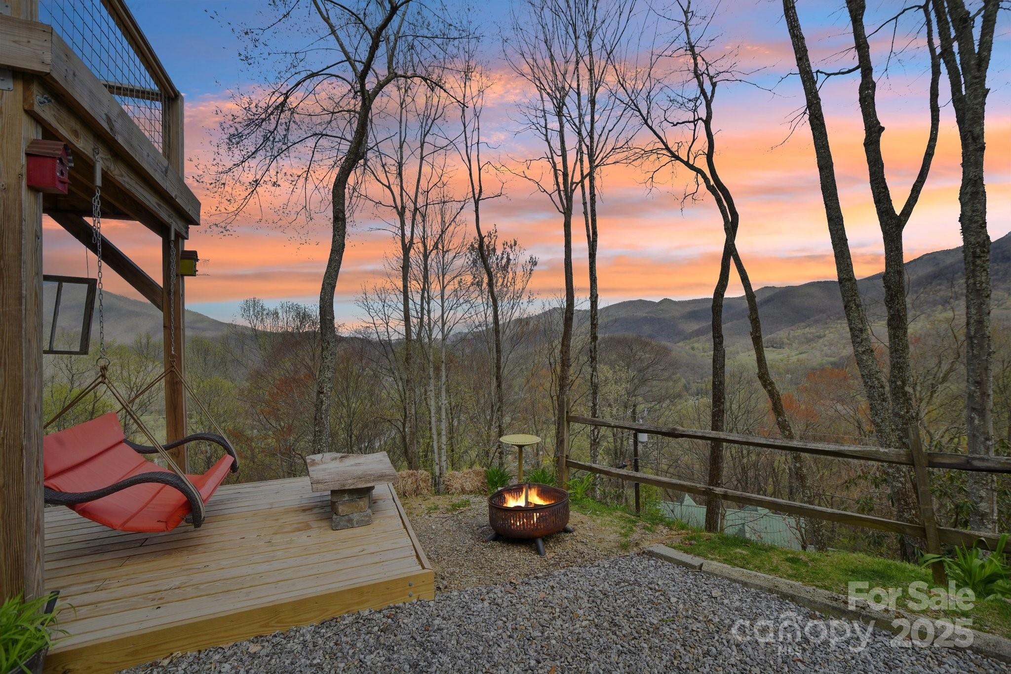 1426 Setzercove Road Maggie Valley, NC 28751 - Photo 12 of 48 a view of a couches in the patio