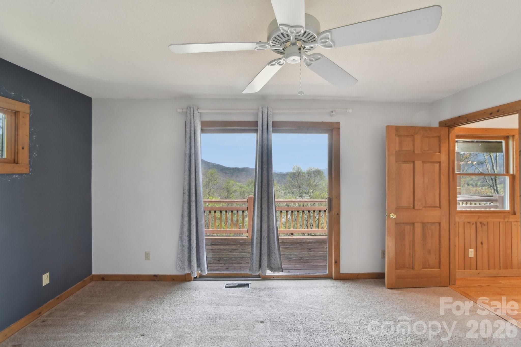 1426 Setzercove Road Maggie Valley, NC 28751 - Photo 17 of 48 an empty room with windows