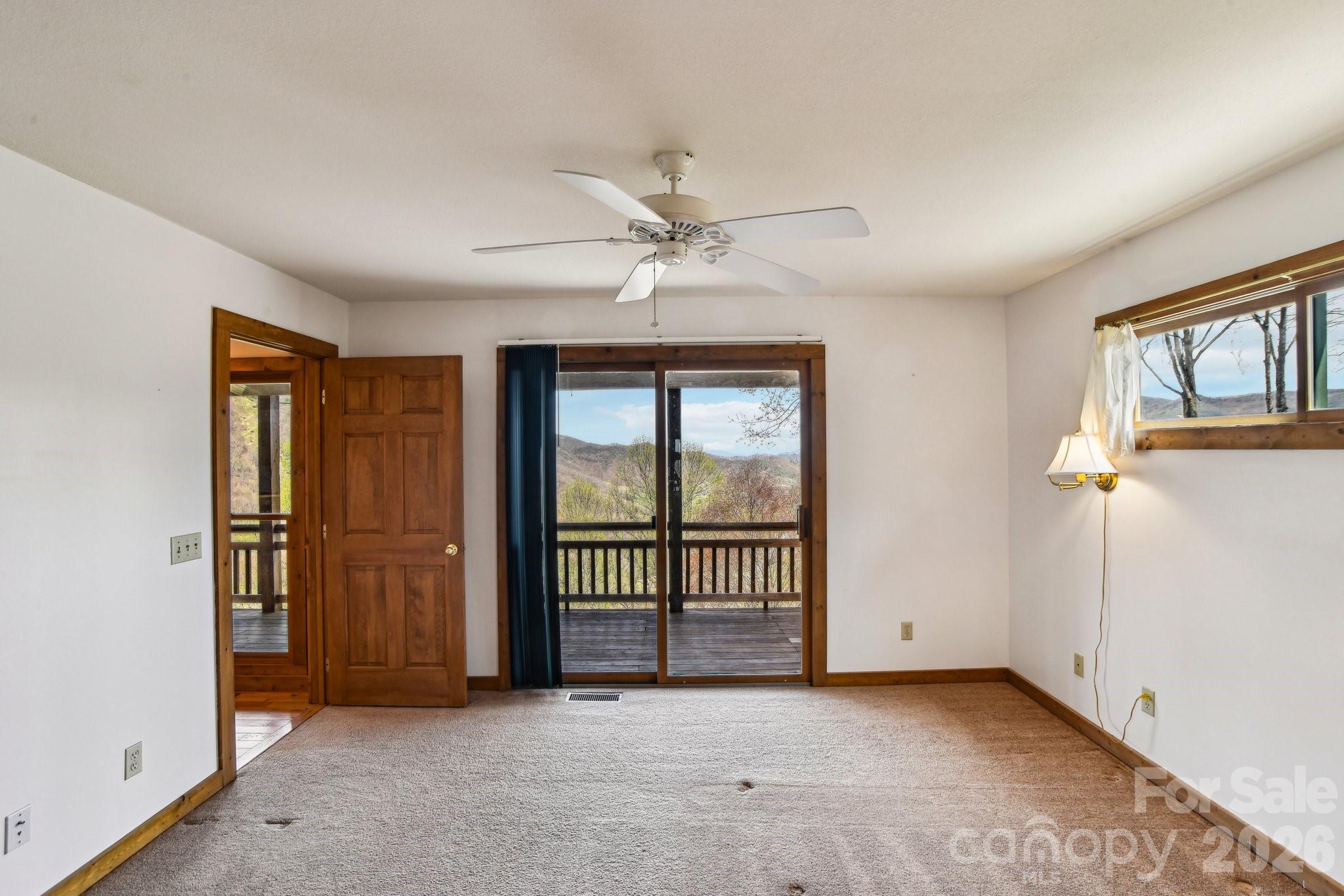 1426 Setzercove Road Maggie Valley, NC 28751 - Photo 22 of 48 an empty room with windows