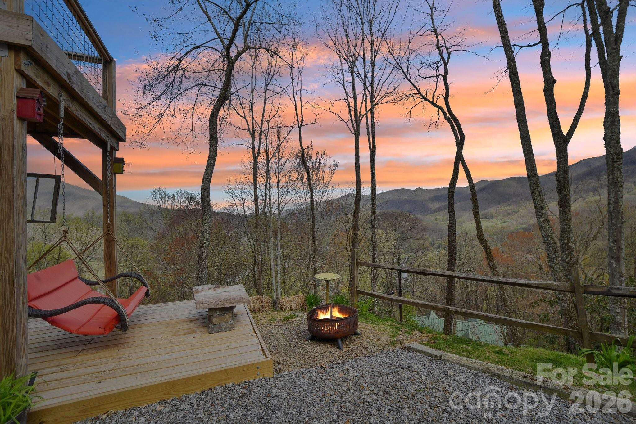 1426 Setzercove Road Maggie Valley, NC 28751 - Photo 3 of 48 a view of a couches in the patio