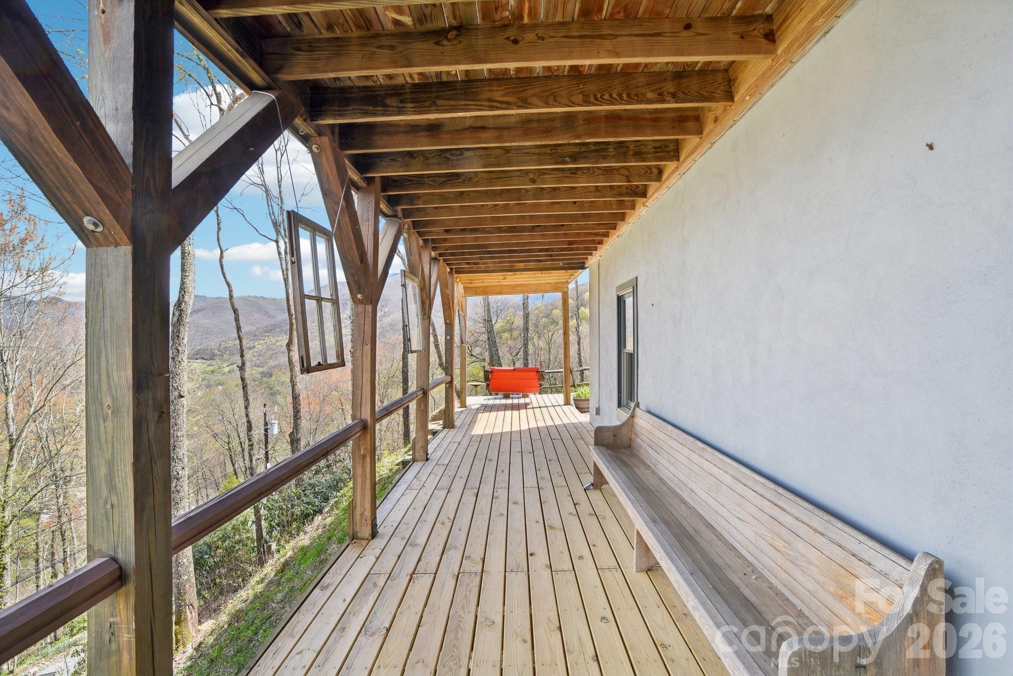 1426 Setzercove Road Maggie Valley, NC 28751 - Photo 6 of 48 a view of sitting area with wooden floor