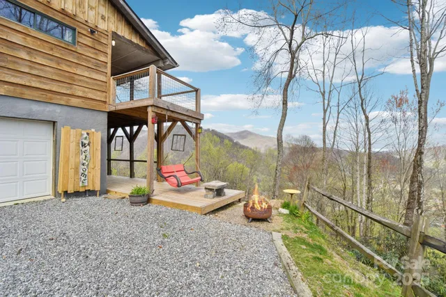 a view of sitting area with furniture and backyard