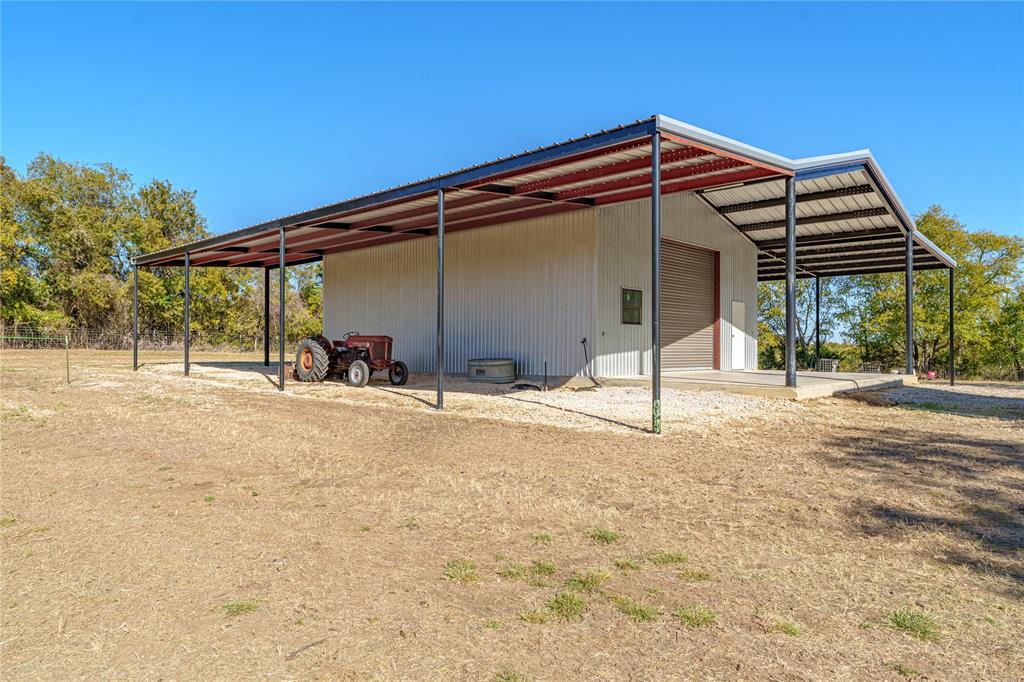 1633 Alexander Road Moody, TX 76557 - Photo 9 of 40 a backyard of a house with shaded area