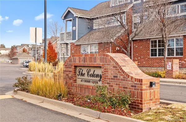 a city street lined with tall buildings