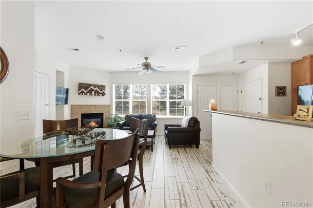 a view of a dining room with furniture window and outside view