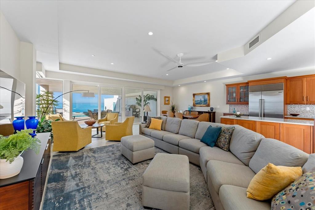 2708 North Beach Road, Unit 2 Englewood, FL 34223 - Photo 23 of 65 a living room with furniture and kitchen view