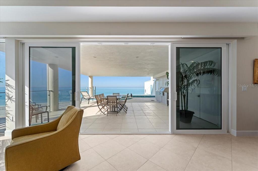 2708 North Beach Road, Unit 2 Englewood, FL 34223 - Photo 29 of 65 a view of a livingroom with furniture and front door