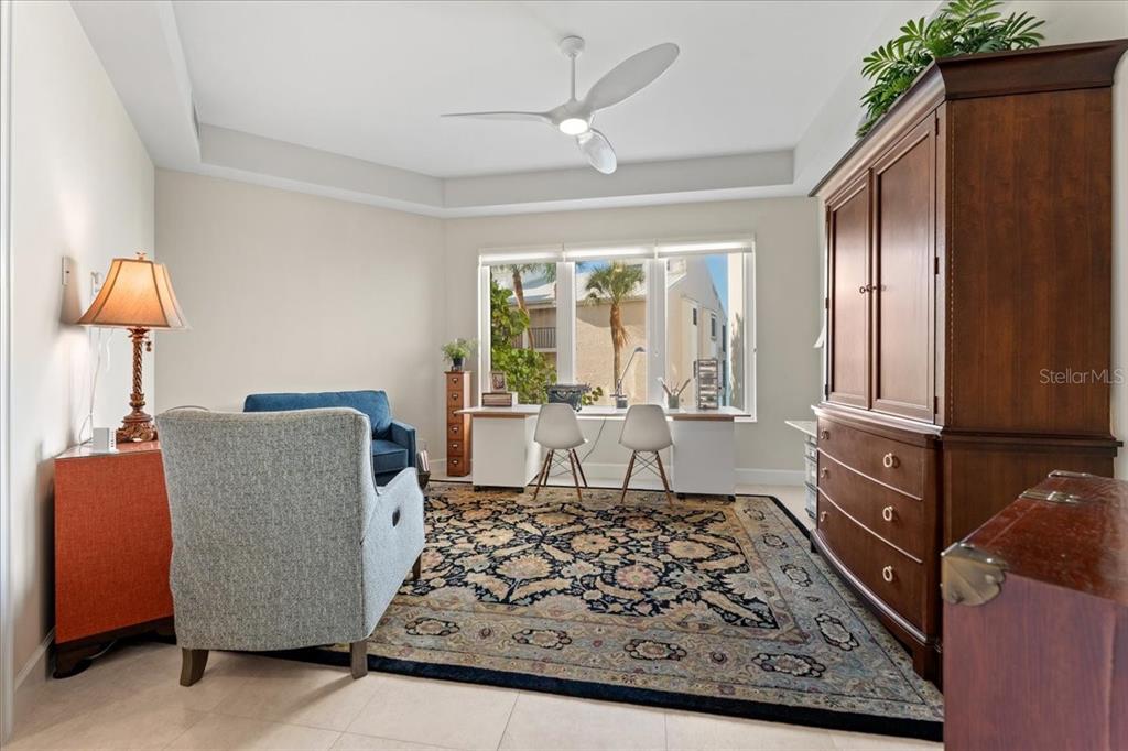2708 North Beach Road, Unit 2 Englewood, FL 34223 - Photo 45 of 65 a living room with furniture and a window