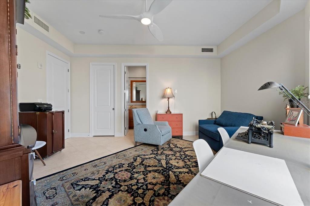 2708 North Beach Road, Unit 2 Englewood, FL 34223 - Photo 48 of 65 a living room with furniture and a couch
