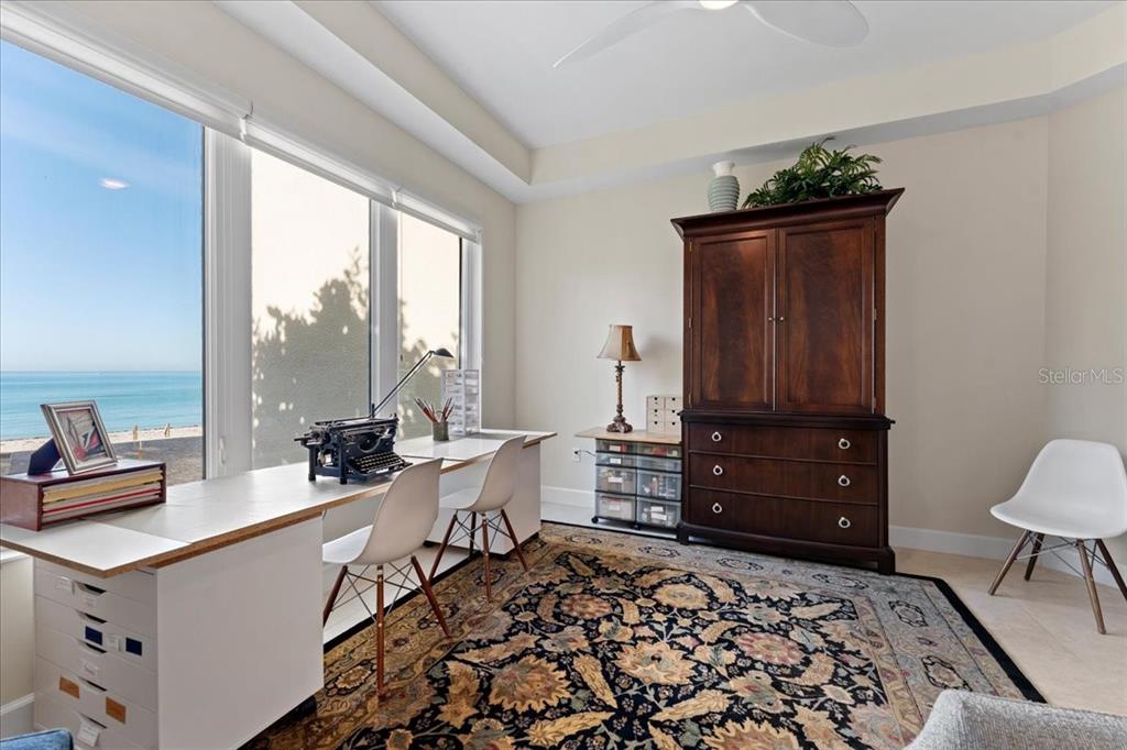 2708 North Beach Road, Unit 2 Englewood, FL 34223 - Photo 49 of 65 a living room with furniture and a window