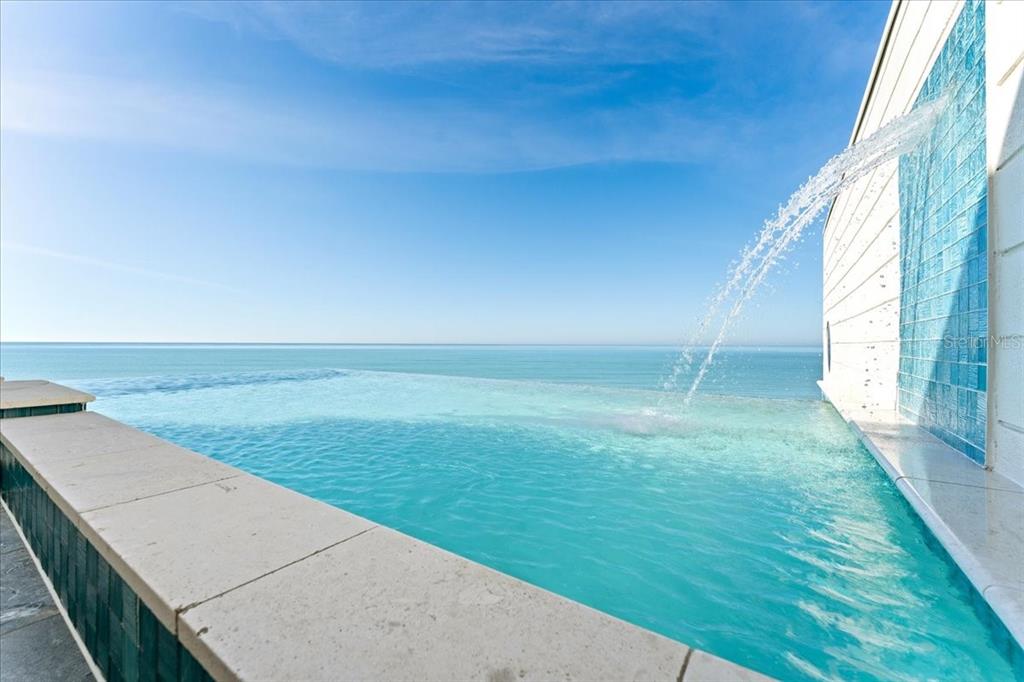 2708 North Beach Road, Unit 2 Englewood, FL 34223 - Photo 56 of 65 a view of an outdoor space and tv