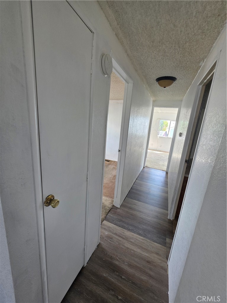 1010 Terrace Road, Unit 142 San Bernardino, CA 92410 - Photo 10 of 21 new flooring in hallway