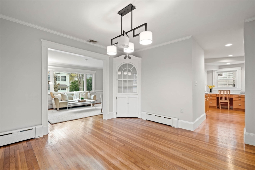 50 Allen Road Winchester, MA 01890 - Photo 11 of 29 a view of a livingroom with furniture wooden floor and a chandelier