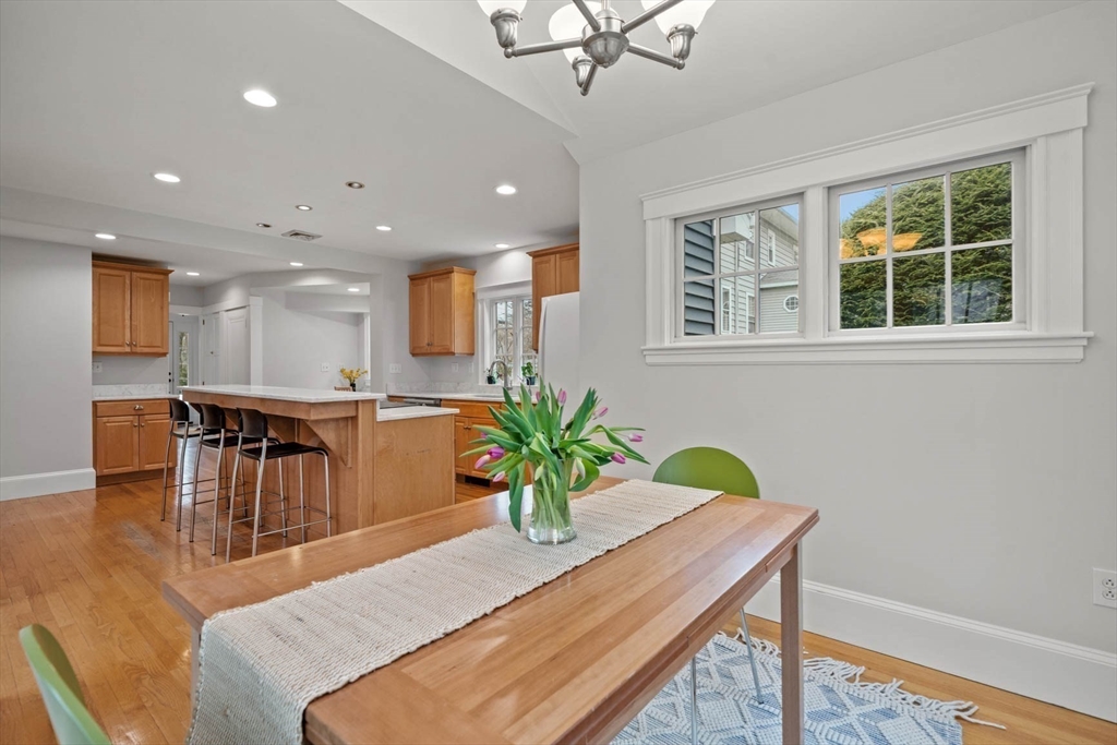 50 Allen Road Winchester, MA 01890 - Photo 15 of 29 a view of a dining room with furniture and a potted plant