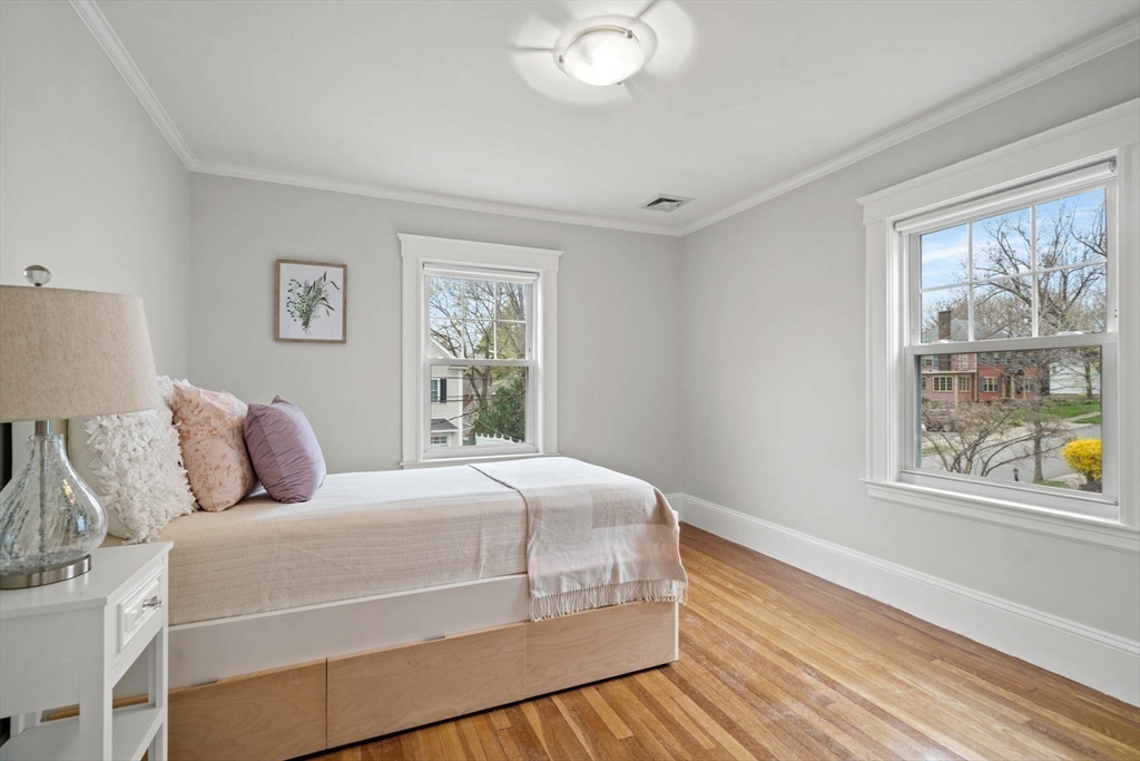 50 Allen Road Winchester, MA 01890 - Photo 17 of 29 a bedroom with a large bed and a window