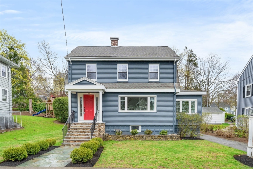 50 Allen Road Winchester, MA 01890 - Photo 2 of 29 a front view of a house with garden
