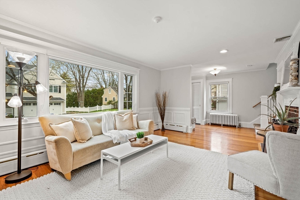 50 Allen Road Winchester, MA 01890 - Photo 8 of 29 a living room with furniture and a large window