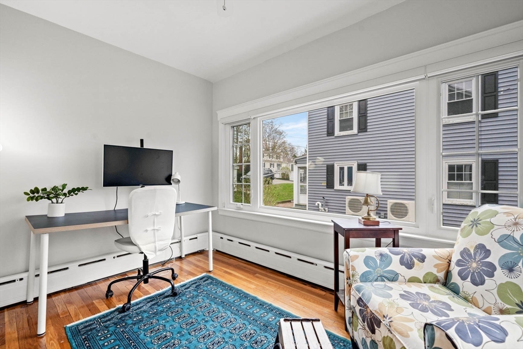 50 Allen Road Winchester, MA 01890 - Photo 10 of 29 a living room with furniture fireplace and window