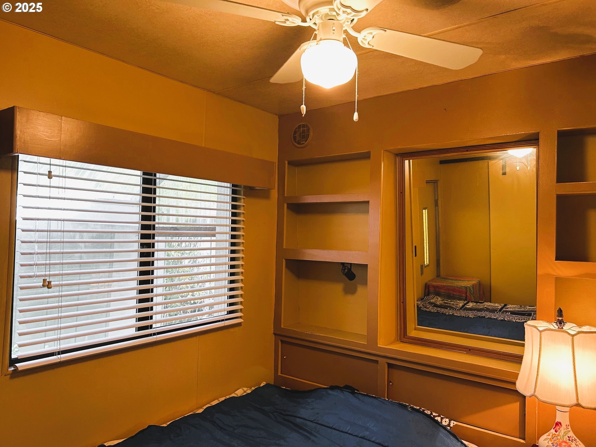 238 Horseshoe Bend Florence, OR 97439 - Photo 23 of 26 a view of a room with a mirror and a window